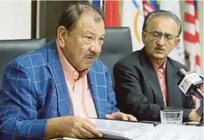  ?? PIC BY MOHD YUSNI ARIFFIN ?? Tunku Imran Tuanku Ja'afar (left) chairs OCM’s executive board meeting in Kuala Lumpur yesterday.