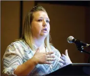  ?? NWA Democrat-Gazette/CHARLIE KAIJO ?? a certified trainer with the Mercy Sports Medicine team, speaks Thursday during a session on dealing with MRSA infections at the Mercy Coaching Summit at the John Q. Hammons Center in Rogers.