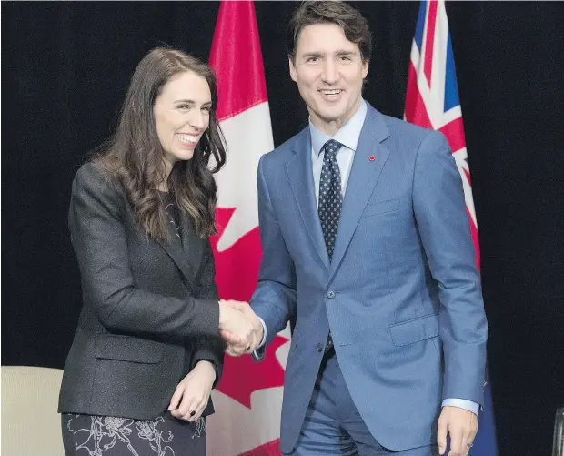  ?? ADRIAN WYLD / THE CANADIAN PRESS FILES ?? “We are one of the countries, perhaps the only country, who had supported Canada throughout” on the cultural-protection issue, New Zealand Prime Minister Jacinda Ardern, shown with Prime Minister Justin Trudeau in November, told journalist­s Tuesday.