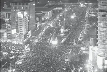  ?? — AFP photo ?? Protesters gather for a rally against South Korea’s President Park Geun-hye in Seoul.