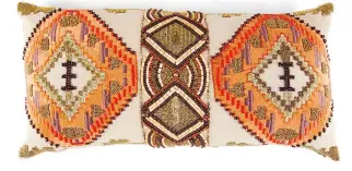  ?? HOMEGOODS ?? Hand beading on a decorative print, which makes a stunning pillow with African flair.