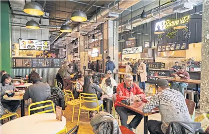  ?? ?? People dine at Urban Hawker in New York, on Jan 9.