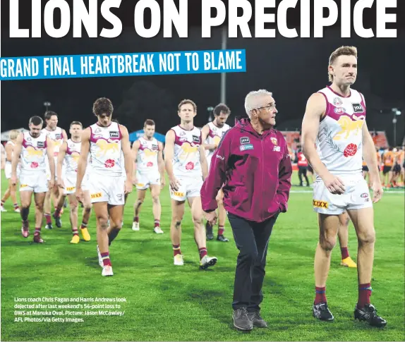  ?? Picture: Jason McCawley/ AFL Photos/via Getty Images. ?? Lions coach Chris Fagan and Harris Andrews look dejected after last weekend’s 54-point loss to GWS at Manuka Oval.