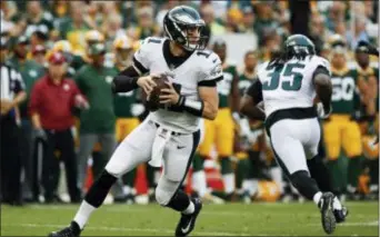  ?? THE ASSOCIATED PRESS FILE ?? Eagles quarterbac­k Carson Wentz feels he’ll be back in passing form and ready to play by the time the Eagles open the season in September.