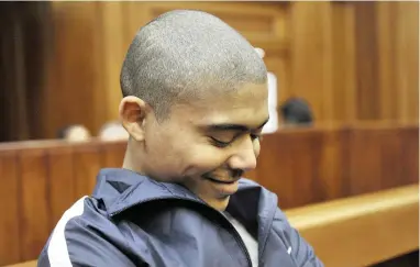  ?? PICTURE: NOOR SLAMDIEN ?? NO REMORSE: Cameron Wilson, 20, clapped and smiled as he was sentenced to four life terms plus 71 years behind bars for a string of crimes, including murder, rape, and attempted murder.