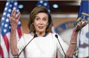  ?? J. SCOTT APPLEWHITE / AP ?? Speaker of the House Nancy Pelosi, D-Calif., meets with reporters as the House prepares to debate on a revised draft of President Joe Biden’s now-$1.85 trillion domestic policy package Thursday.