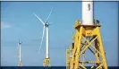  ?? Michael Dwyer / Associated Press ?? Wind turbines from the Deepwater Wind project stand off Block Island, R.I.