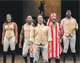  ?? Craig Schwartz ?? SPOOFING “Hamilton” are “Spamilton” performers Zakiya Young, left, Wilkie Ferguson III, William Cooper Howell, John Devereaux and Dedrick A. Bonner.