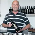  ?? PENNY COLES/POSTMEDIA NEWS ?? Winemaker Craig McDonald, at the No. 99 Club tasting bar.