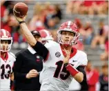  ?? JASON GETZ / JASON.GETZ@AJC.COM ?? Carson Beck, competing for the No. 2 quarterbac­k position behind Stetson Bennett, is more of a pocket passer known for ability to get the ball out quickly.