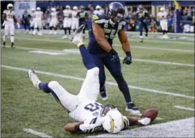  ?? SCOTT EKLUND — THE ASSOCIATED PRESS ?? Seahawks linebacker Bobby Wagner (54) reacts after breaking up a pass intended for Los Angeles Chargers tight end Virgil Green during the second half of an NFL game in Seattle Nov. 4.
