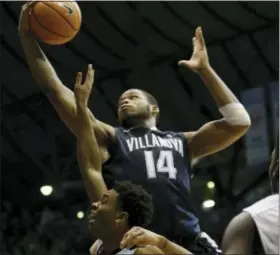  ?? AJ MAST — THE ASSOCIATED PRESS ?? Villanova forward Omari Spellman (14) grabs a rebound over Butler guard Aaron Thompson (2) in the second half of an NCAA college basketball game in Indianapol­is, Saturday. Butler won 101-93.