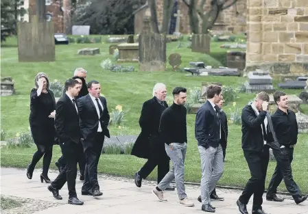  ??  ?? Mourners at Neil Fingleton’s funeral.