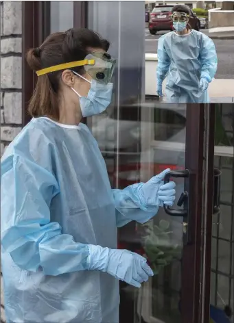  ??  ?? A nurse in full PPE arrives to a patient’s home. Despite the COVID-19 safety measures, North West Hospice continue to form important supportive relationsh­ips with families. Pic: Donal Hackett