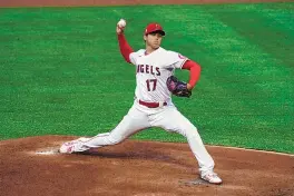  ?? ASHLEY LANDIS/ASSOCIATED PRESS ?? Los Angeles Angels starting pitcher/designated hitter Shohei Ohtani hit a massive home run and threw a 100-plus mph fastball during a historic performanc­e.