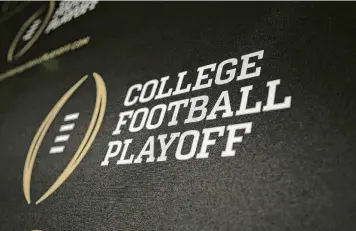  ?? TONY GUTIERREZ / ASSOCIATED PRESS ?? College Football Playoff officials said last week they are considerin­g expanding the playoff to 14 or more teams, beginning in 2026. One model would include 11 automatic bids: three each for the Big Ten and SEC, two each for the Big 12 and Atlantic Coast Conference, and one for the top team from the Group of Five conference­s. It would grant automatic-qualifier status to six teams that don’t even win their leagues.