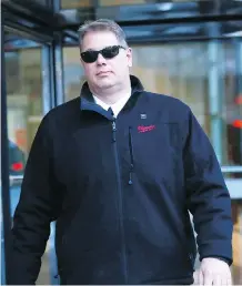  ?? MAKOWICHUK/FILES DARREN ?? Philip Heerema leaves Calgary Courts after being charged in 2015. He has pleaded not guilty to 20 charges involving eight alleged victims.