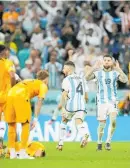  ?? Photo / AP ?? Nicolas Otamendi makes a “mouse ears” gesture towards Dutch players after their match was decided on penalties.