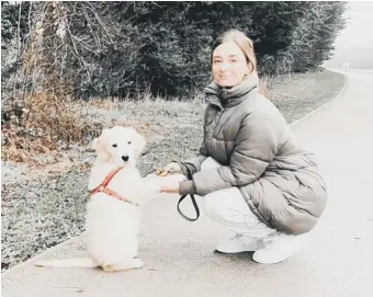  ??  ?? Lauren Baarnes and her puppy Bentley