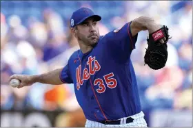  ?? LYNNE SLADKY — THE ASSOCIATED PRESS ?? New York Mets starting pitcher Justin Verlander (35) throws during the first inning of a spring training baseball game against the Houston Astros, Friday, March 10, 2023, in Port St. Lucie, Fla.