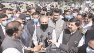  ??  ?? ISLAMABAD
President Dr. Arif Alvi talking to media after offering funeral prayers of veteran Hurriyat leader and the icon of Kashmir Freedom Movement, Syed Ali Shah Geelani in absentia at Parliament House. -APP