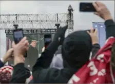  ?? Kenny Holston/The New York Times ?? Supporters of then-President Donald Trump watch him speak at a rally Jan. 6, 2021, before the violent attack on the U.S. Capitol in Washington.