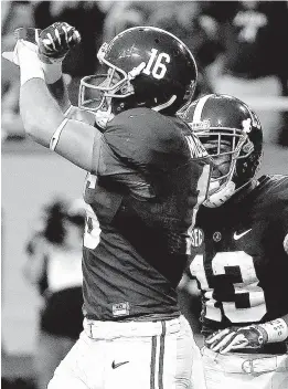  ?? Associated Press ?? Alabama wide receiver Richard Mullaney celebrates his touchdown against Florida during the second half of the Southeaste­rn Conference championsh­ip on Saturday in Atlanta, Ga.