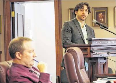  ?? MILLICENT MCKAY/JOURNAL PIONEER ?? Steve Howard, right, addresses Summerside City councillor­s during a recent committee of council meeting. Howard presented to council about his concerns over the city’s possible deal with Kore Energy to install a $23 million generator.