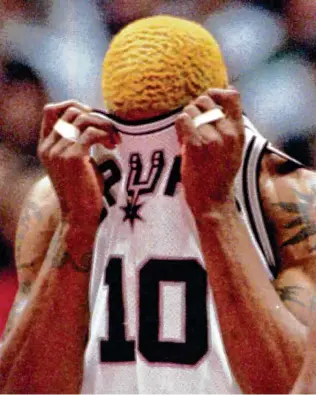  ?? Associated Press file photo ?? Dennis Rodman averaged 17.1 rebounds in his two seasons with the Spurs and helped them to the best record in the league in 1994-95. But not surprising­ly, he never really fit in.