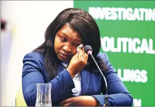  ?? Picture: Bongani Mbatha/African News Agency/ANA ?? HEARTBROKE­N: Widow Phumza Diko breaks down as she testifies before the Moerane Commission probing the political killings in KwaZulu-Natal.