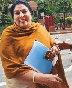  ?? PTI ?? Congress leader Renuka Chowdhury during the budget session of Parliament in New Delhi yesterday