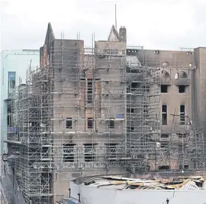  ?? Picture: PA. ?? The fire-ravaged shell of the historic Mackintosh Building.