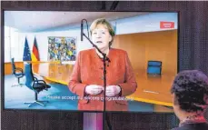  ?? FOTO: CHRISTIAN FLEMMING ?? Bundeskanz­lerin Angela Merkel hebt in ihrem Grußwort die Rolle von Frauen in Friedenspr­ozessen hervor.