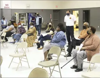  ?? Katie West • Times-Herald ?? Area residents asks questions about an upcoming special election on a sales tax extension to fund numerous projects in the city. Registered Forrest City voters will decide 11 separate issues on the special election ballot.