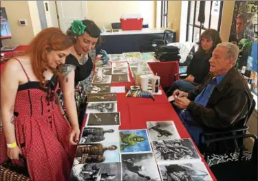  ?? VIRGINIA LINDAK — FOR DIGITAL FIRST MEDIA ?? Ricou Browning, who played the “Gill Man” in the original “Creature From the Black Lagoon” film greets fans at BlobFest.