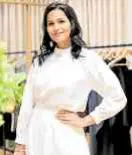  ??  ?? Actress Iza Calzado pairs a white long-sleeved top with a flowy white skirt.