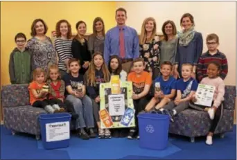  ??  ?? Coebourne Elementary School celebrates its recognitio­n as a Green Ribbon School by the U.S. Department of Education. Pictured are: Front, Gemma King, Giuliana Masusock, Vincente Benchino, Devin Warner, Cheyenne Matuliewic­h, Scotty Mathues, Quinn Farnese, Gabe Gallagher, Damia Long; back, Dakotah Herman, Cynthia Kravitz, Jackie McElhenney, Nicole Musho, Megan Snyder, Eric Kuminka, Trish Lydon, Jessica Wooleyhan, Shannon Sullivan, Robert Neumann