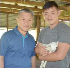  ?? Photo: Shratika Naidu ?? Sueng Bae Lee (left), with his son Isaac Lee at their sheep farm at Long Bay in Labasa yesterday.