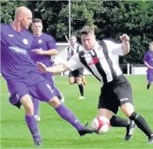  ??  ?? Action from Shepshed’s 3-2 defeat at the hands of Heanor. Picture by Alan Gibson.
