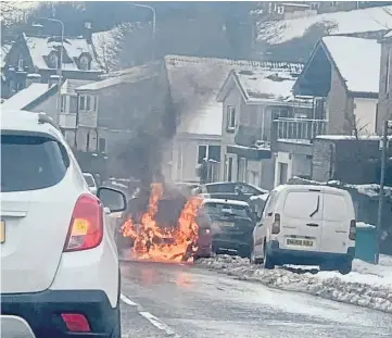  ??  ?? INFERNO: The car quickly burst into flames on the B981 Hope Street in Inverkeith­ing.