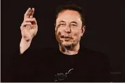  ?? Kirsty Wiggleswor­th/Associated Press ?? Elon Musk wrote, “Will make things good with the bakery” after Tesla abruptly canceled a $16,000 order.
