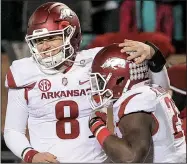  ?? Arkansas Democrat-Gazette/BENJAMIN KRAIN ?? Running back Rawleigh Williams (right) accounted for five touchdowns in Arkansas’ victory over Mississipp­i State, which was one of three victories for the Razorbacks in the second half of the season.