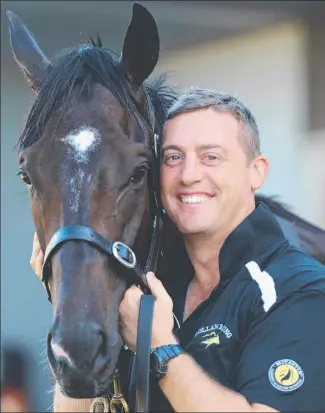  ?? STABLE STAR: Trainer Tony Gollan with his Magic Millions horse, Ef Troop. ??