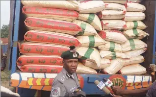  ??  ?? Nigeria Customs Service (NCS), Customs Area Controller (CAC), Federal Operation Unit (FOU), Zone C, Comptrolle­r Mohamed Garba displaying some of the contraband intercepte­d by men and officers of the unit in Owerri...recently