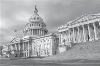  ?? MARK REINSTEIN/CORBIS VIA GETTY IMAGES ?? The U.S. Capitol building is seen at Washington D.C. on Jan. 18, 2017. House Democrats are planning to vote to reopen the federal government and end the shutdown on Thursday — but their funding bills will provide no money for President Donald Trump’s border wall.