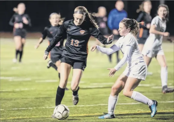  ?? Photos by Eric Jenks / Special to the Times Union ?? Bethlehem’s Piper Gregory, who scored the go-ahead goal with 3:25 left, tries to get past Shenendeho­wa’s Haylee Evertsen in the Class AA title game.