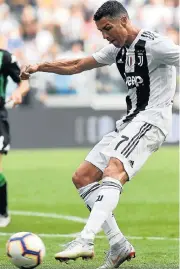  ?? /Reuters ?? New weapon: Cristiano Ronaldo scores his second goal for Juventus against Sassuolo at the weekend.