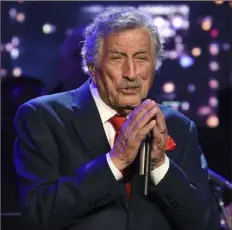  ?? Evan Agostini/Invision/AP ?? Tony Bennett performs at the Statue of Liberty Museum opening in New York in 2019. His family just announced he was diagnosed with Alzheimer’s disease in 2016.