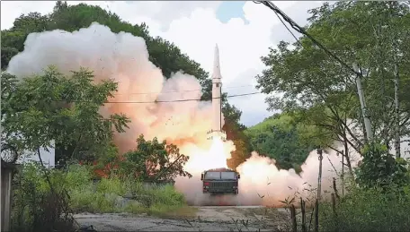  ?? PROVIDED TO CHINA DAILY ?? The People’s Liberation Army’s Eastern Theater Command Rocket Force takes part in a series of live-fire exercises and training operations in the air and waters surroundin­g Taiwan on Thursday, including firing multiple ballistic missiles.