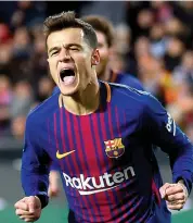  ?? AFP ?? Barcelona’s Philippe Coutinho celebrates scoring against Valencia in the Copa del Rey second leg semi- final at the Mestalla Stadium in Valencia on Thursday. Barcelona won 2- 0. —